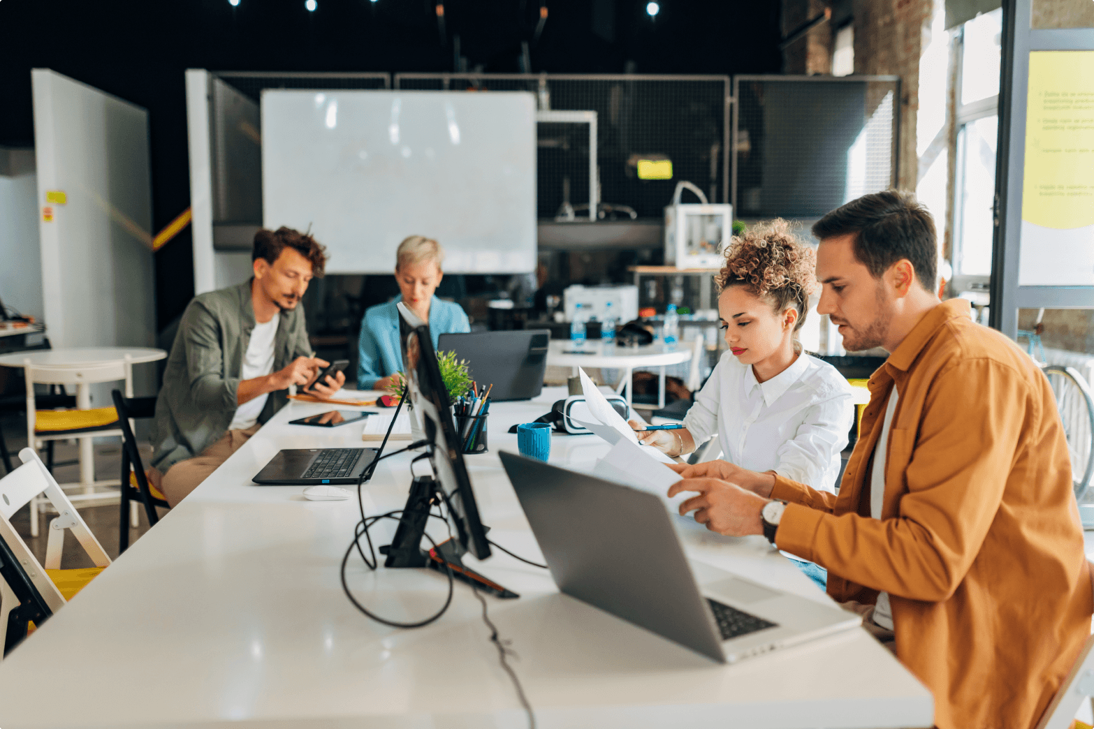 An office image with creatives working on some awesome Dogear graphics